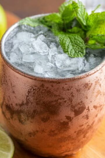 Best Moscow Mule Recipe in 5 Minutes | Easy Vodka Cocktail 29 Moscow Mule Recipe Classic Moscow Mule cocktail served in a copper mug with crushed ice, fresh mint, and lime slices.