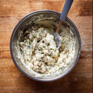 7-Step Sausage Stuffed Shells That'll Make Your Family 16 Creamy ricotta and Italian sausage filling mixed in a bowl for stuffed shells